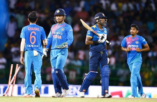 MS Dhoni and Yuzvendra Chahal celebrate wicket of Sri Lanka's Angelo Mathews. (PTI) MS Dhoni and Yuzvendra Chahal celebrate wicket of Sri Lanka's Angelo Mathews. (PTI)