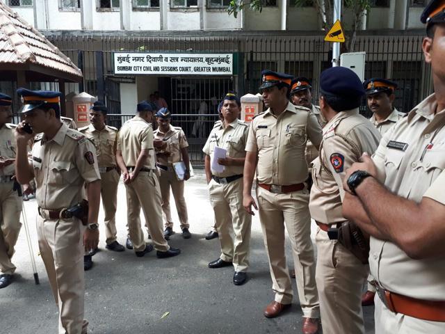 Cops stand guard outside the court. (Bhushan Koyande) Cops stand guard outside the court. (Bhushan Koyande)