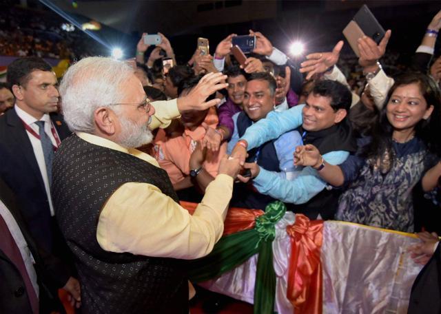 Prime Minister Narendra Modi interacting with the Indian Community during an event at Yangon in Myanmar on September 6. (PTI Photo) Prime Minister Narendra Modi interacting with the Indian Community during an event at Yangon in Myanmar on September 6. (PTI Photo)