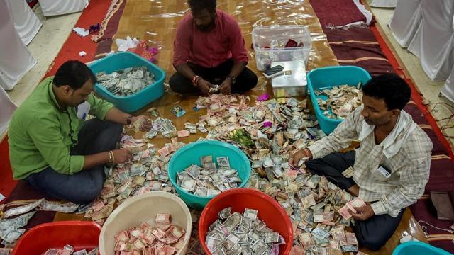 The counting in progress at Lalbaugcha Raja mandal. (HT)