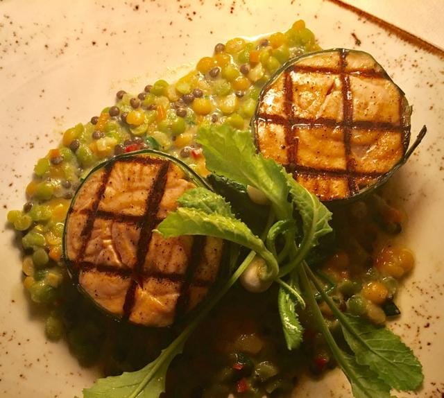 Tandoori masala rubbed salmon with five lentil khichdi, one of the dishes cooked by Vikas Khanna Tandoori masala rubbed salmon with five lentil khichdi, one of the dishes cooked by Vikas Khanna