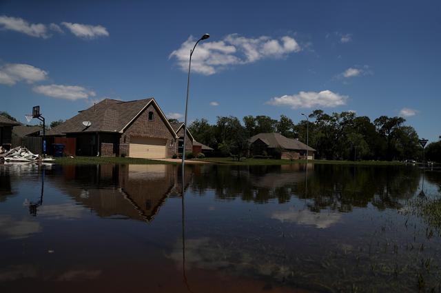 Floodwaters surround houses in Richwood, Texas, on Thursday. Over a week after Hurricane Harvey hit Southern Texas, residents are beginning the long process of recovering from the storm. (AFP) Floodwaters surround houses in Richwood, Texas, on Thursday. Over a week after Hurricane Harvey hit Southern Texas, residents are beginning the long process of recovering from the storm. (AFP)
