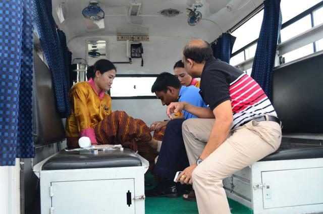 Injured air hostesses of the Royal Bhutan Airlines being treated by coast guard personnel. (Photo courtesy: Indian Coast guard)