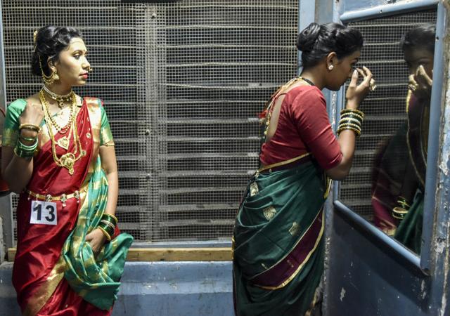 Contestants get ready backstage for the ‘traditional wear’ round of the Mr &amp; Ms Maharashtra Fashion Pageant held in Mumbai last week. (Kunal Patil / HT Photo)