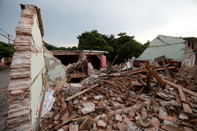 Buildings destroyed by an earthquake that struck off the southern coast of Mexico late on Thursday are seen on a street in Juchitan. (REUTERS) Buildings destroyed by an earthquake that struck off the southern coast of Mexico late on Thursday are seen on a street in Juchitan. (REUTERS)