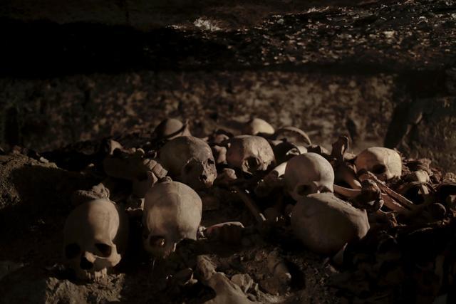 Skulls found in the New Kingdom tomb that belongs to a royal goldsmith are illuminated in a burial shaft, in Luxor on September 9. (AP Photo) Skulls found in the New Kingdom tomb that belongs to a royal goldsmith are illuminated in a burial shaft, in Luxor on September 9. (AP Photo)
