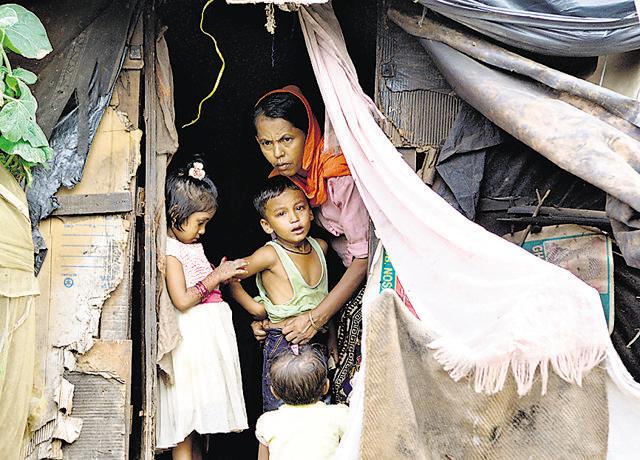 A Rohingya family at their makeshift hut in the refugee settlement in Jammu. (Nitin Kanotra/HT Photo) A Rohingya family at their makeshift hut in the refugee settlement in Jammu. (Nitin Kanotra/HT Photo)