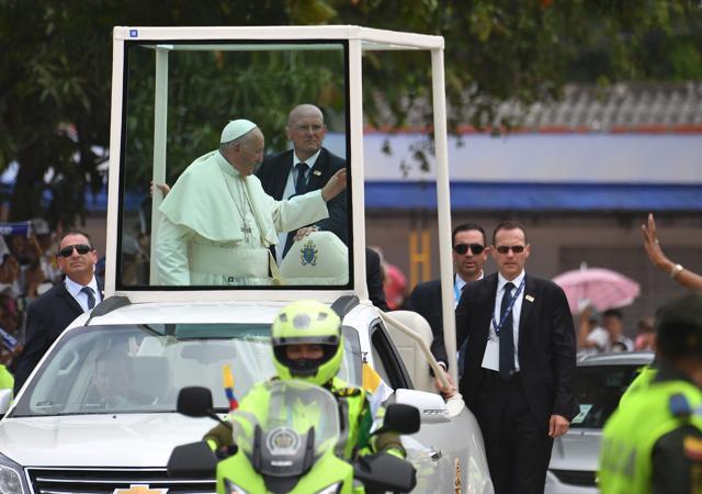 Pope Francis waves to faithful on September 10 in Cartagena, Colombia. Nearly 1.3 million worshippers flocked to a mass by Pope Francis on Saturday in the Colombian city known as the stronghold of the late drug lord Pablo Escobar. (AFP) Pope Francis waves to faithful on September 10 in Cartagena, Colombia. Nearly 1.3 million worshippers flocked to a mass by Pope Francis on Saturday in the Colombian city known as the stronghold of the late drug lord Pablo Escobar. (AFP)