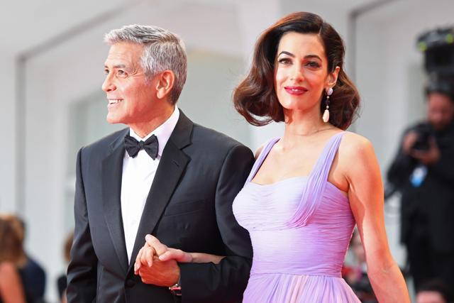 US actor and director George Clooney and his wife Amal attend the premiere of the movie Suburbicon presented out of competition at the 74th Venice Film Festival on September 2, 2017 at Venice Lido. (AFP) US actor and director George Clooney and his wife Amal attend the premiere of the movie Suburbicon presented out of competition at the 74th Venice Film Festival on September 2, 2017 at Venice Lido. (AFP)