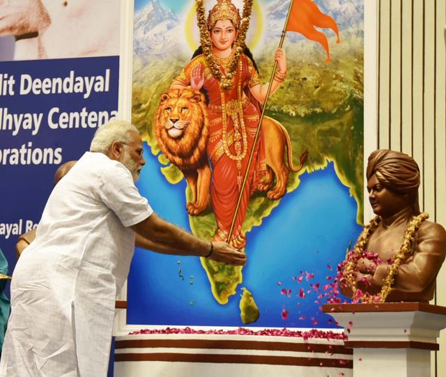 Prime Minister Narendra Modi pays floral tributes to Swami Vivekananda in New Delhi on the 125th anniversary of his Chicago address. (PIB photo) Prime Minister Narendra Modi pays floral tributes to Swami Vivekananda in New Delhi on the 125th anniversary of his Chicago address. (PIB photo)