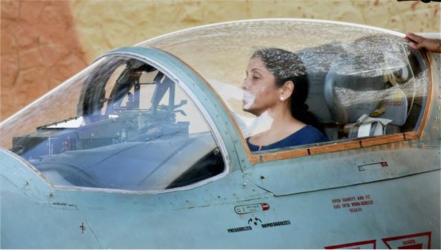 Sitharaman inside the cockpit of MIG-21 Biscon during her visit to Air Force Station Uttarlai. (PTI Photo) Sitharaman inside the cockpit of MIG-21 Biscon during her visit to Air Force Station Uttarlai. (PTI Photo)