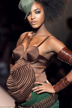 Jourdan Dunn, two months before she was due, walked in Jean Paul Gaultier’s Spring 2010 show in a custom version of the designer’s bodycon bustier (AFP/Getty Images) Jourdan Dunn, two months before she was due, walked in Jean Paul Gaultier’s Spring 2010 show in a custom version of the designer’s bodycon bustier (AFP/Getty Images)