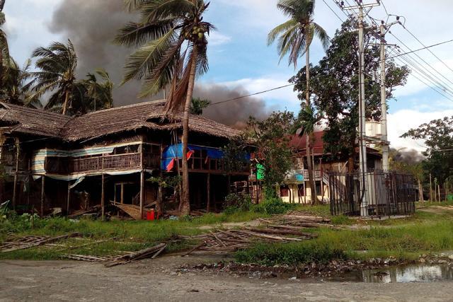 Smoke from houses burnt by Rohingya militants in Maungdaw township in Rakhine State of Myanmar. (AFP Photo) Smoke from houses burnt by Rohingya militants in Maungdaw township in Rakhine State of Myanmar. (AFP Photo)