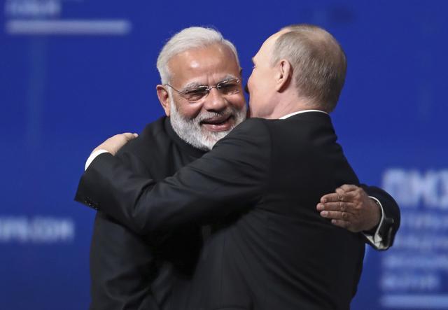 In this June 2, 2017, file photo, Russian President Vladimir Putin and Indian Prime Minister Narendra Modi hug in St. Petersburg, Russia. (AP) In this June 2, 2017, file photo, Russian President Vladimir Putin and Indian Prime Minister Narendra Modi hug in St. Petersburg, Russia. (AP)