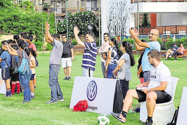 Parents and friends cheer for their favourite team at SARE Homes HT GIFA.