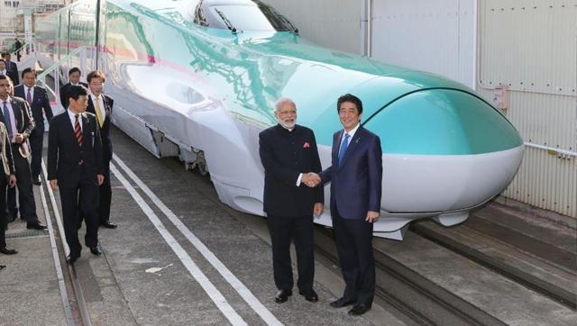 Prime Minister Narendra Modi with his Japanese counterpart Shinzo Abe during their inspection of a bullet train manufacturing plant in Kobe, Hyogo prefecture,Japan, November 2016. (AFP)