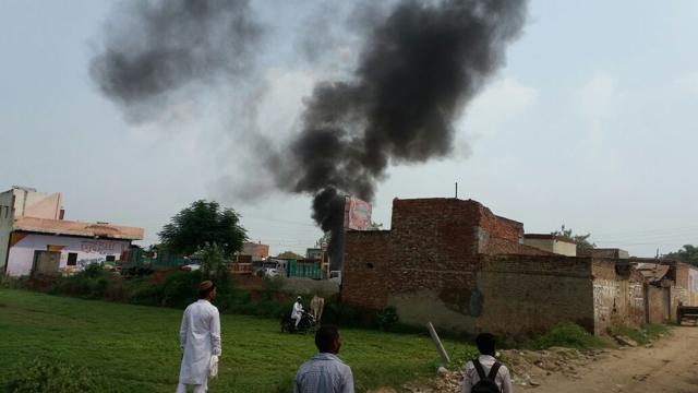 Angry villagers pelted stones at the police and torched a few vehicles. (Hindustan Times) Angry villagers pelted stones at the police and torched a few vehicles. (Hindustan Times)