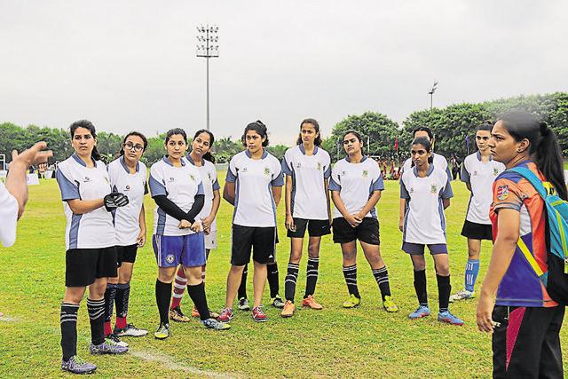 A women’s team from SARE Homes HT GIFA before a match.