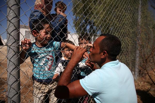 Remaining in Syria was not an option Ammar said, having lost his second-eldest child, Jumah, who was almost five when he was killed. He now counts the days until he can finally be with his family. (Yiannis Kourtoglou / REUTERS) Remaining in Syria was not an option Ammar said, having lost his second-eldest child, Jumah, who was almost five when he was killed. He now counts the days until he can finally be with his family. (Yiannis Kourtoglou / REUTERS)
