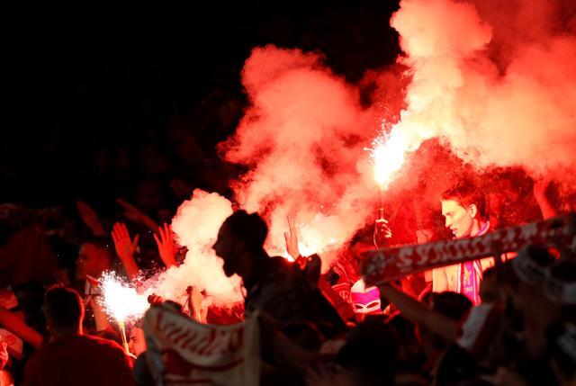 The match between Arsenal F.C and F.C. Cologne was delayed for an hour due to crowd trouble. (REUTERS)