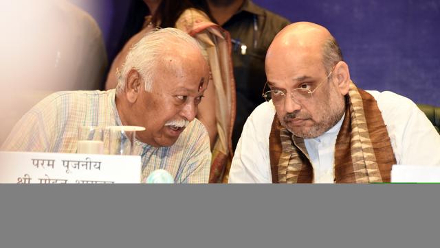 Rashtriya Swayamsevak Sangh Chief Mohan Bhagwat with BJP National Chief Amit Shah at the release of a book on the life of PM Narendra Modi in New Delhi on July 12, 2017. (Sonu Mehta/HT PHOTO) Rashtriya Swayamsevak Sangh Chief Mohan Bhagwat with BJP National Chief Amit Shah at the release of a book on the life of PM Narendra Modi in New Delhi on July 12, 2017. (Sonu Mehta/HT PHOTO)
