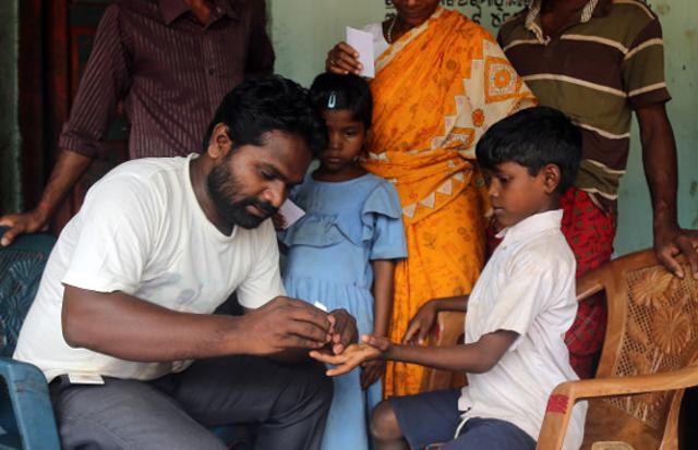 A health worker with Rapid Diagnostic Kit (RDK) strips, the strips are bivalent and detect falciparum, vivax and mixed malaria. A droplet of blood is collected on the strip which is inserted in the RDK, results usually take 15-30 minutes. (IndiaSpend) A health worker with Rapid Diagnostic Kit (RDK) strips, the strips are bivalent and detect falciparum, vivax and mixed malaria. A droplet of blood is collected on the strip which is inserted in the RDK, results usually take 15-30 minutes. (IndiaSpend)