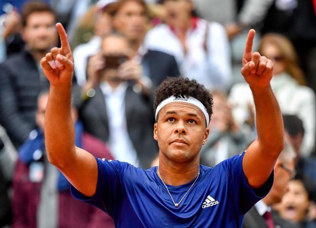Jo-Wilfried Tsonga helped France draw level with Serbia in the other semi-final after Lucas Pouille, world number 80 suffered a defeat in the first game. (AFP) Jo-Wilfried Tsonga helped France draw level with Serbia in the other semi-final after Lucas Pouille, world number 80 suffered a defeat in the first game. (AFP)