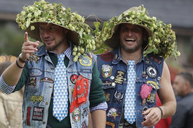 Visitors wearing funny clothes wait for the opening of the 184th Oktoberfest. (Matthias Schrader/AP) Visitors wearing funny clothes wait for the opening of the 184th Oktoberfest. (Matthias Schrader/AP)