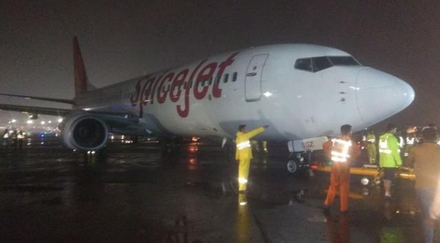 A SpiceJet aircraft had skidded off the runway and got stuck in mud, leading to the closure of the main runway at the airport. (HT Photo) A SpiceJet aircraft had skidded off the runway and got stuck in mud, leading to the closure of the main runway at the airport. (HT Photo)