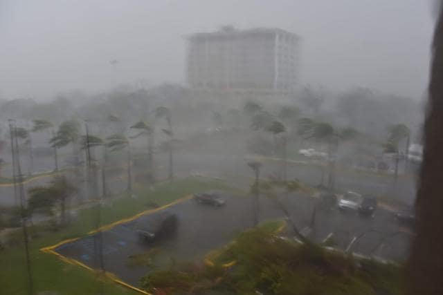 Rain and wind hit a parking lot at Roberto Clemente Coliseum in San Juan, Puerto Rico, on September 20, 2017, during Hurricane Maria. (AFP) Rain and wind hit a parking lot at Roberto Clemente Coliseum in San Juan, Puerto Rico, on September 20, 2017, during Hurricane Maria. (AFP)