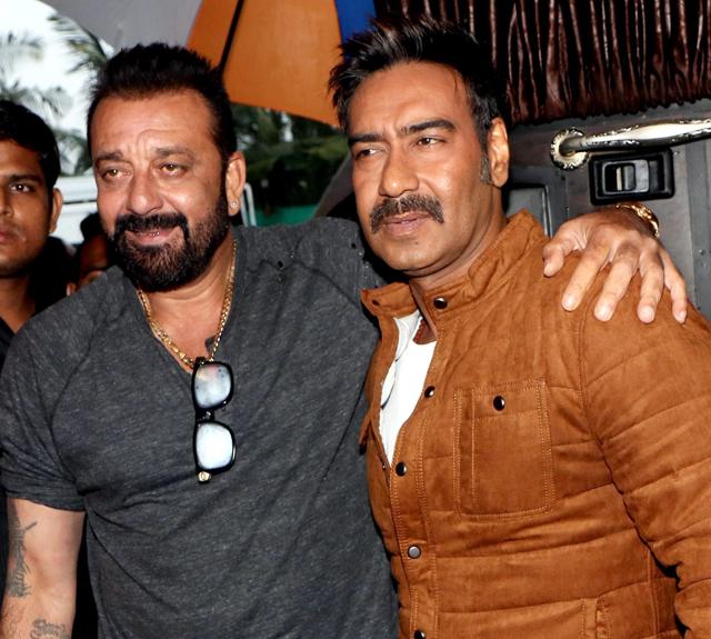 Sanjay Dutt and Ajay Devgn during the eighth season of Fear Factor: Khatron Ke Khiladi semi final shoot, in Mumbai on Tuesday. (PTI)
