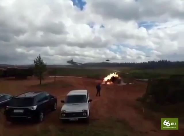 A still from an undated video provided by 66.ru shows an explosion after a helicopter fired a rocket in Luzhsky range in Russia. (AP) A still from an undated video provided by 66.ru shows an explosion after a helicopter fired a rocket in Luzhsky range in Russia. (AP)
