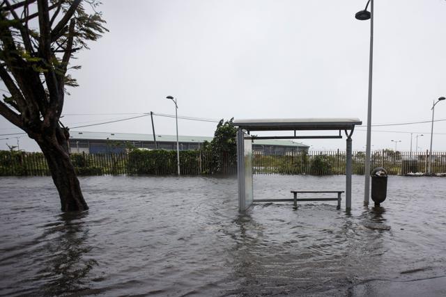 A flooded road and a bus stop in the French territory of Guadeloupe after the passage of Hurricane Maria. (AFP) A flooded road and a bus stop in the French territory of Guadeloupe after the passage of Hurricane Maria. (AFP)