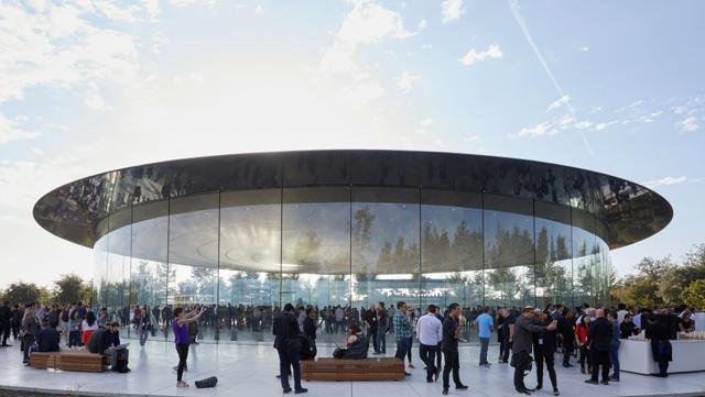 The Steve Jobs Theater - a 20-foot-tall glass cylinder situated atop a hill