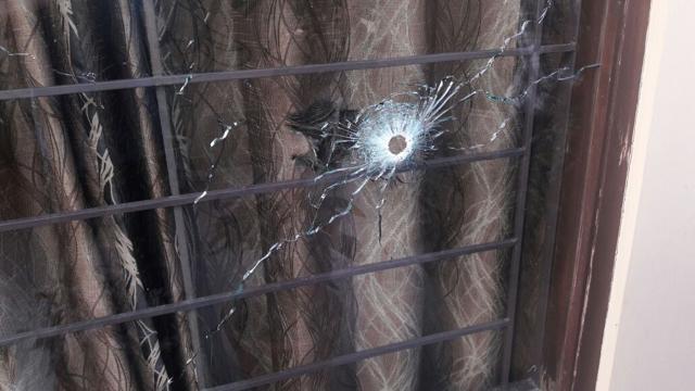 Shots fired by the commando hit a number of glass panes in the vicinity. (HT Photo)
