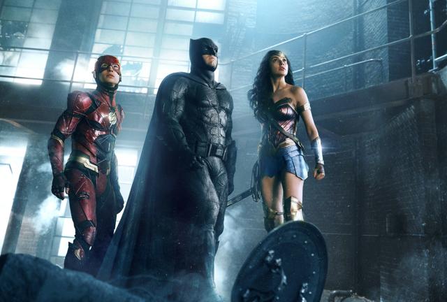 This image released by warner Bros. Pictures shows Ezra Miller, from left, Ben Affleck and Gal Gadot in a scene from Justice League. (AP) This image released by warner Bros. Pictures shows Ezra Miller, from left, Ben Affleck and Gal Gadot in a scene from Justice League. (AP)
