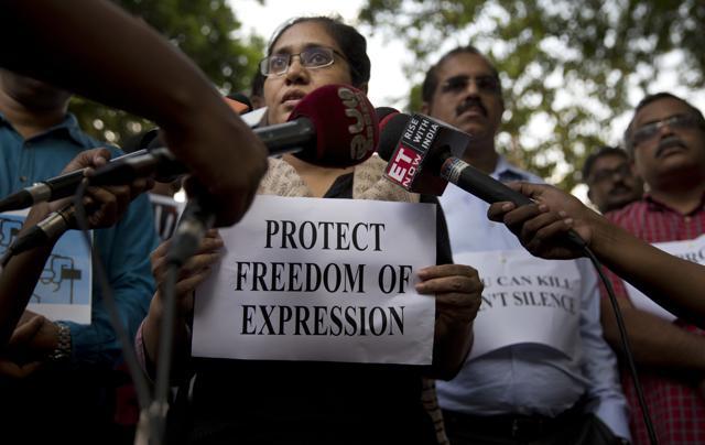 A journalist holds a placard and speaks to the media during a protest against the killing of a TV news reporter Shantanu Bhowmick in New Delhi, India, Thursday, Sept. 21, 2017. (AP) A journalist holds a placard and speaks to the media during a protest against the killing of a TV news reporter Shantanu Bhowmick in New Delhi, India, Thursday, Sept. 21, 2017. (AP)