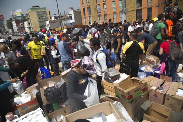 Volunteers prepare food and water for emergency personnel searching for survivors in Mexico City, Mexico on September 20, 2017. (AP) Volunteers prepare food and water for emergency personnel searching for survivors in Mexico City, Mexico on September 20, 2017. (AP)