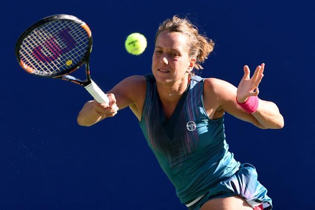 Barbora Strycova of the Czech Republic hits a return against Johanna Konta of Britain. (AFP) Barbora Strycova of the Czech Republic hits a return against Johanna Konta of Britain. (AFP)