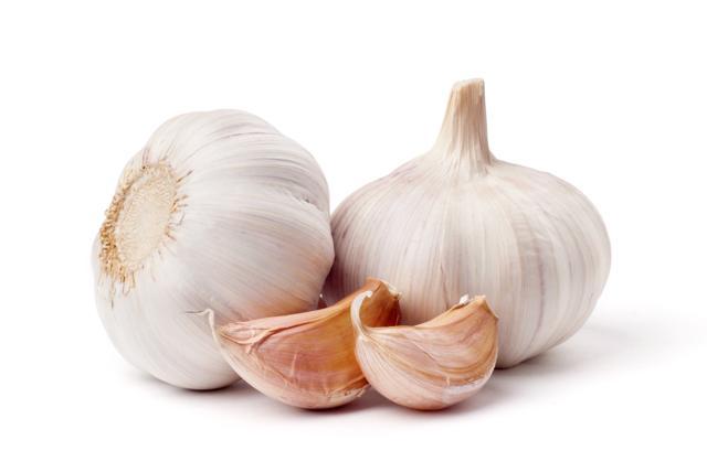 Garlic lowers blood pressure and blood sugar levels (Shutterstock)