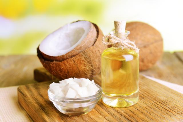 Instead of being stored as fat in the body coconut oil mobilise existing fat stores and burn belly fat (Shutterstock)