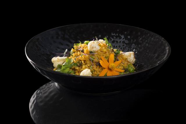 Cauliflower, green peas and quinoa pulao - prepared by Chef Manish Mehrotra.