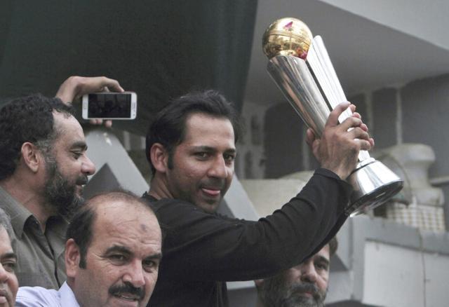 In this June 20, 2017 file photo, Pakistani cricket team's skipper Sarfraz Ahmed raises Champions Trophy for a crowd gathered to welcome him, outside his residence in Karachi. The Pakistan Cricket Board on July 4, 2017, appointed Ahmed as Test captain. (AP) In this June 20, 2017 file photo, Pakistani cricket team's skipper Sarfraz Ahmed raises Champions Trophy for a crowd gathered to welcome him, outside his residence in Karachi. The Pakistan Cricket Board on July 4, 2017, appointed Ahmed as Test captain. (AP)