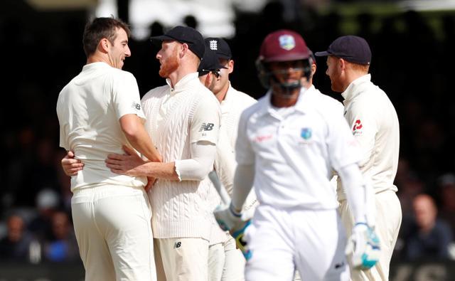 England's Toby Roland-Jones celebrates with teammates after taking the wicket of West Indies' Shane Dowrich in the third Test on September 9 (Action Images via Reuters) England's Toby Roland-Jones celebrates with teammates after taking the wicket of West Indies' Shane Dowrich in the third Test on September 9 (Action Images via Reuters)