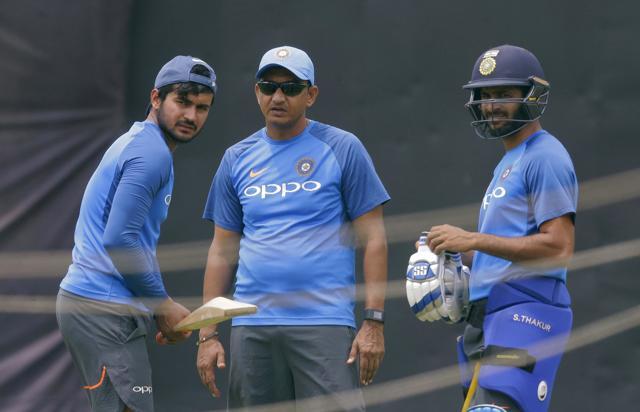 India's cricket team batting coach Sanjay Bangar, centre, talks to Manish Pandey, left, and Shardul Thakur. (AP) India's cricket team batting coach Sanjay Bangar, centre, talks to Manish Pandey, left, and Shardul Thakur. (AP)