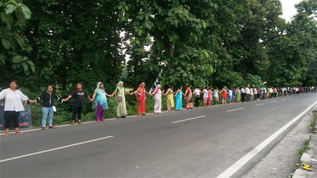 Gorkha Janmukti Morcha (GJM) activists form human chain during a protest in Sukna near Siliguri. (PTI File Photo) Gorkha Janmukti Morcha (GJM) activists form human chain during a protest in Sukna near Siliguri. (PTI File Photo)
