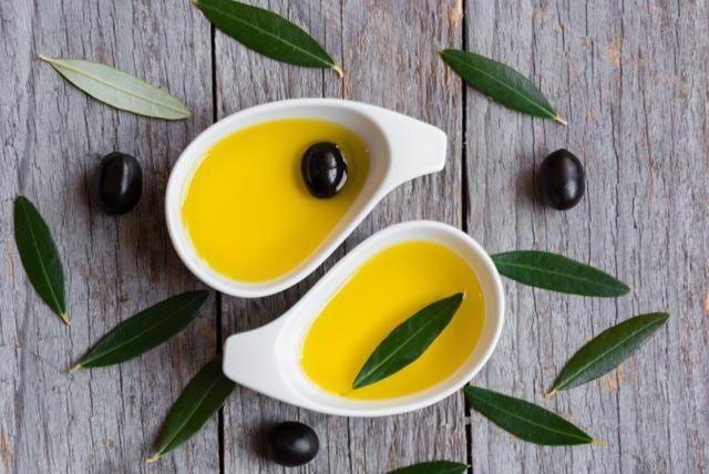 Pure refined olive oil is good for cooking where you pan fry or sauté things. (Shutterstock) Pure refined olive oil is good for cooking where you pan fry or sauté things. (Shutterstock)