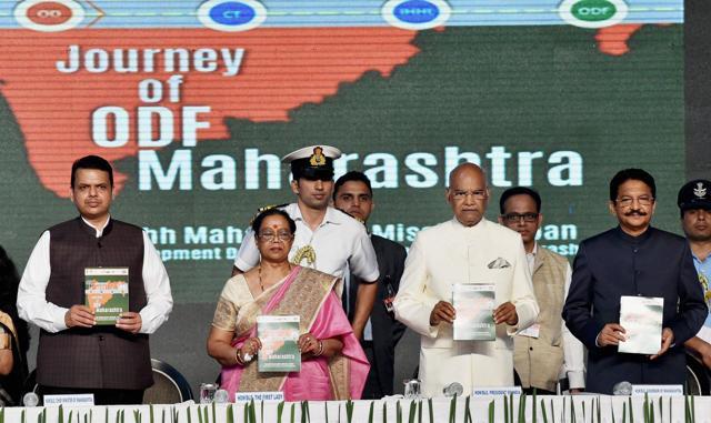 President Ram Nath Kovind (3rd from L), with First Lady Savita Kovind, governor of Maharashtra C Vidyasagar Rao (R) and chief minister Devendra Fadnavis (L), releasing a publication during the declaration of Urban Maharashtra as Open Defecation Free, in Mumbai on Sunday. (PTI) President Ram Nath Kovind (3rd from L), with First Lady Savita Kovind, governor of Maharashtra C Vidyasagar Rao (R) and chief minister Devendra Fadnavis (L), releasing a publication during the declaration of Urban Maharashtra as Open Defecation Free, in Mumbai on Sunday. (PTI)