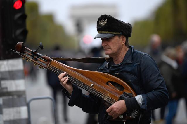 Australian street musician Lindsay Buckland of the band 'Famous Unknowns' plays along the Champs Elysees. (AFP Photo) Australian street musician Lindsay Buckland of the band 'Famous Unknowns' plays along the Champs Elysees. (AFP Photo)