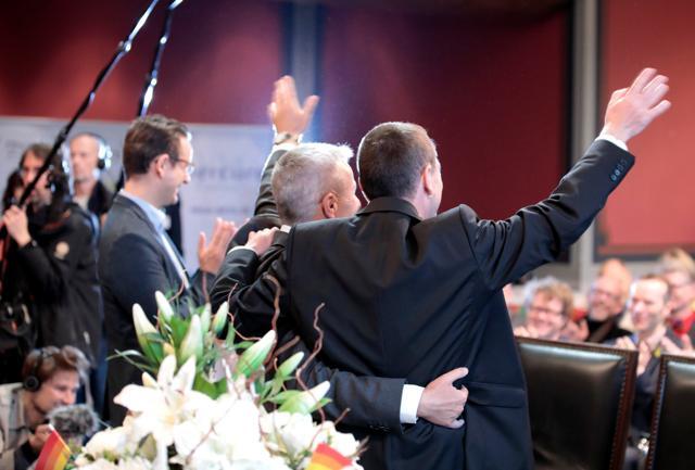 Same-sex couple Karl Kreil and Bodo Mende get married at a civil registry office, becoming Germany's first married gay couple after German parliament approved marriage equality in a historic vote this past summer, in Berlin, Germany October 1. (Reuters Photo)